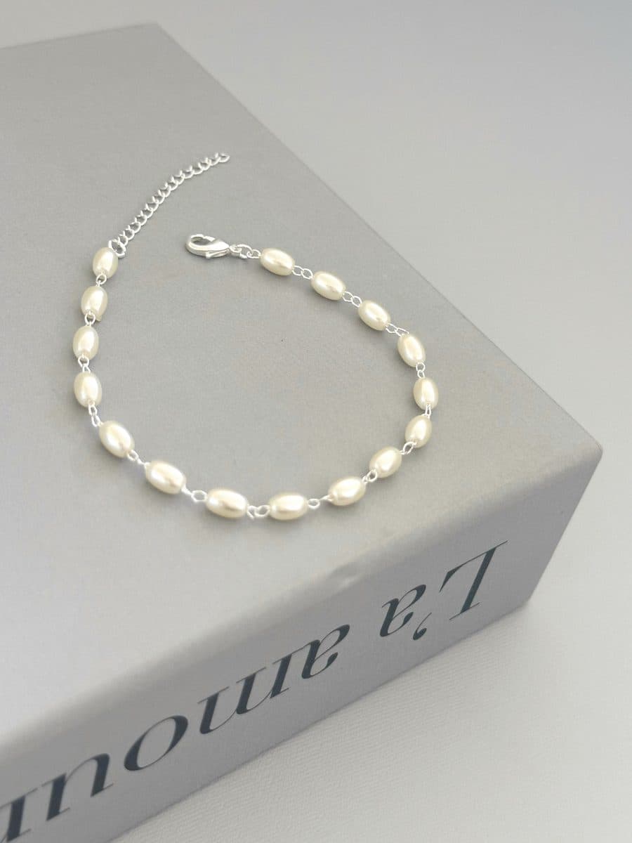 Pulseira pérolas ovais